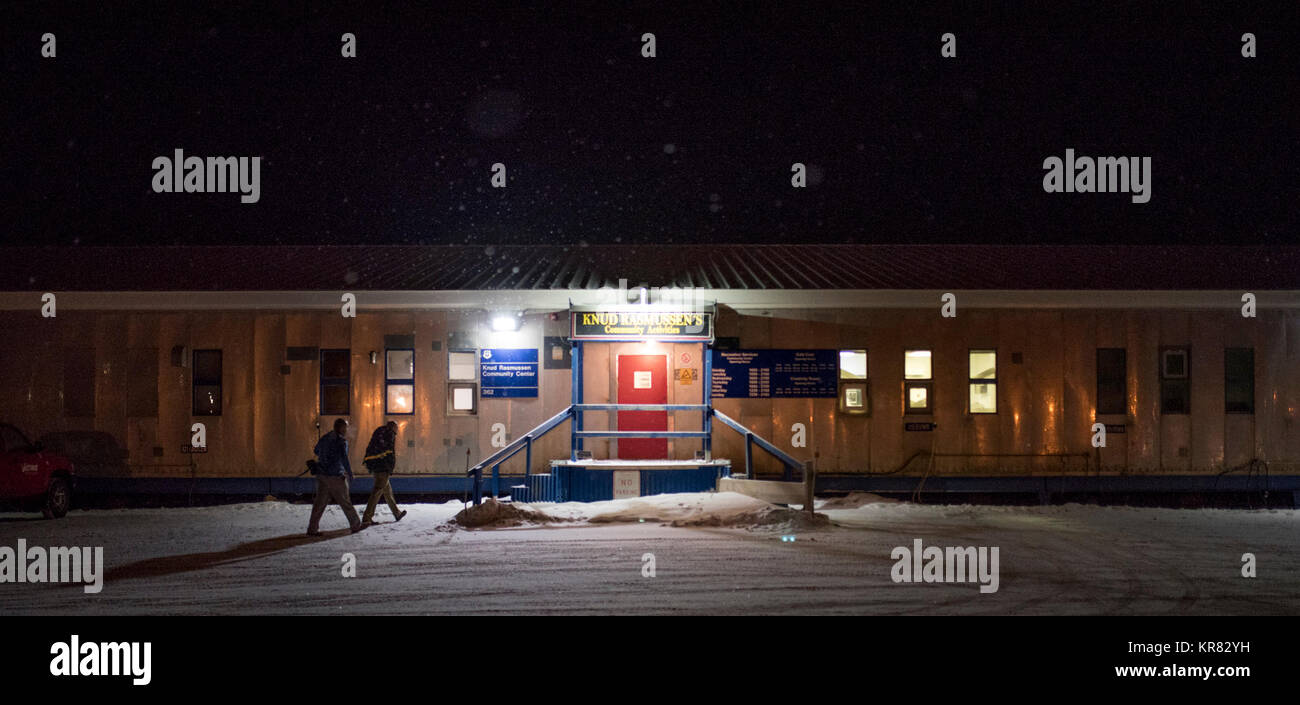 Airmen walk into the Community Center at Thule Air Base, Greenland, Dec 10, 2017. The center provides Airmen with activities such as video games, internet access, coffee and a library.  (U.S. Air Force Stock Photo