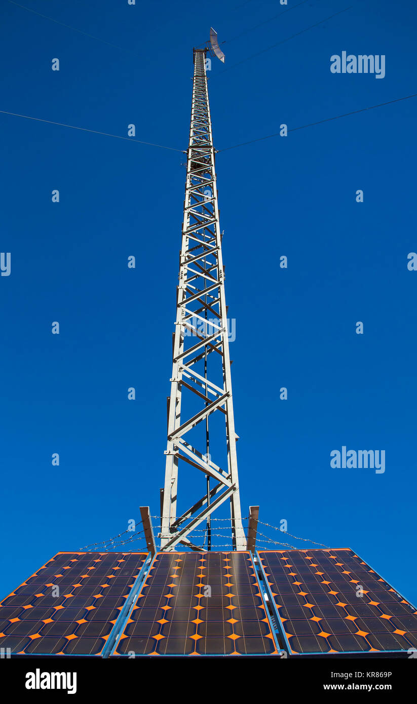 Communications Tower with Solar Panel Stock Photo - Alamy