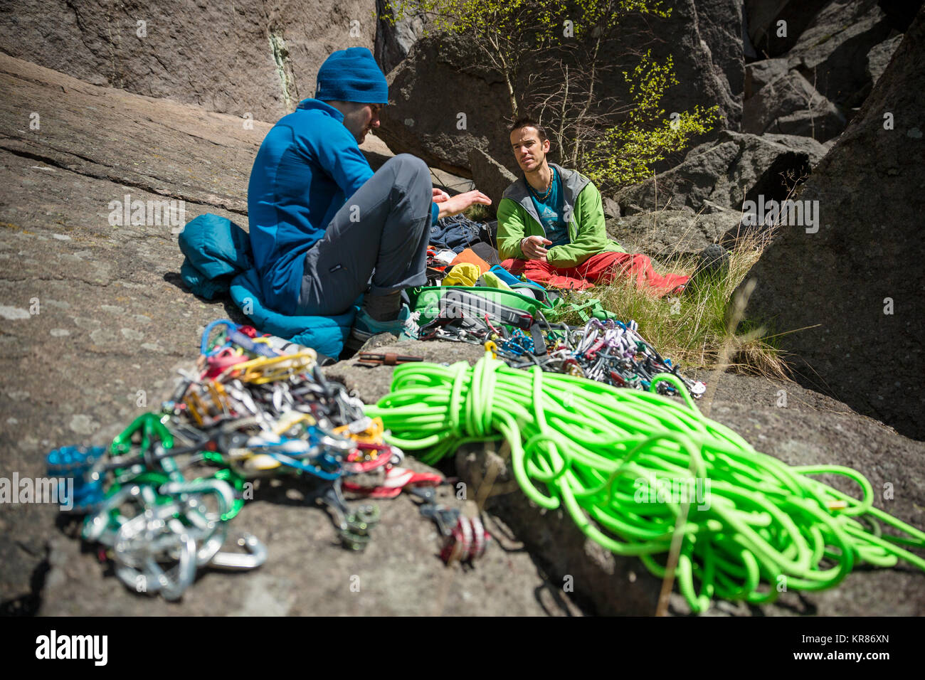 Rock climbers prepare their equipment Stock Photo Alamy