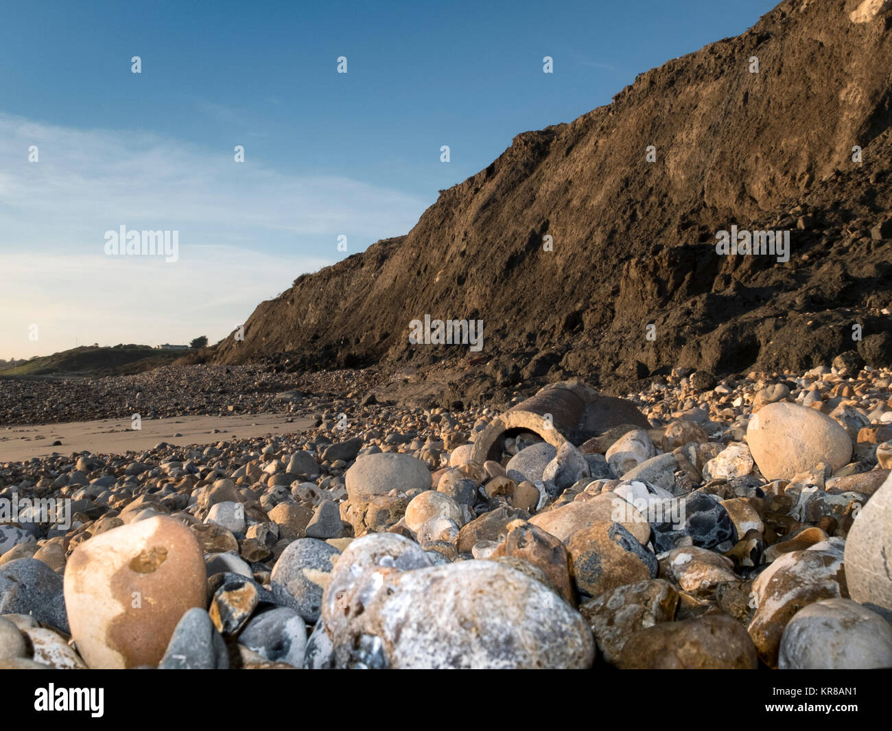 Evidence of cliff and coastal erosion, lost buildings and exposed ...