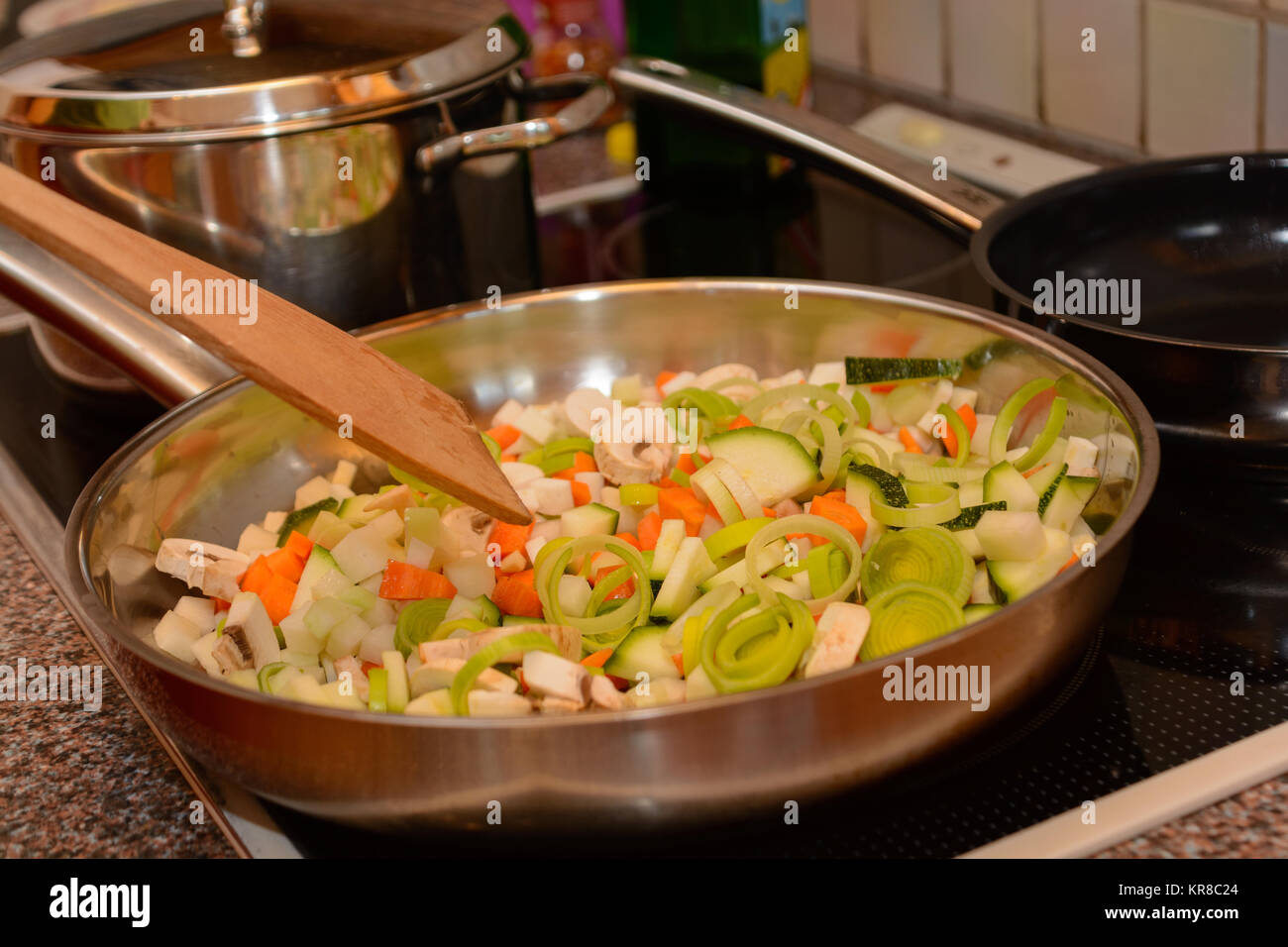 colorful vegetables is fried Stock Photo