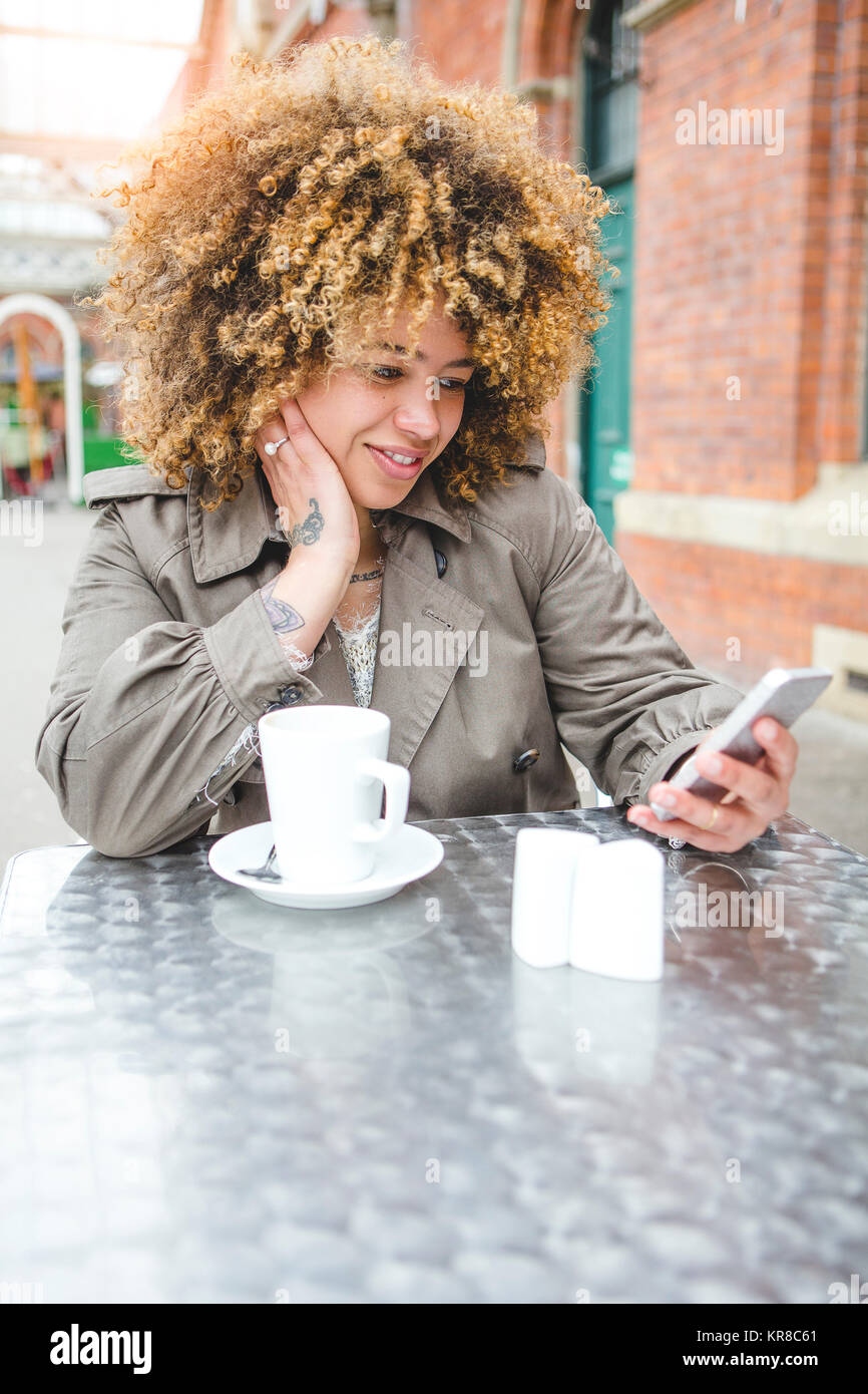 Tea and Texting Stock Photo Alamy