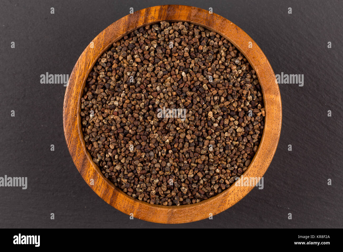 Decorticated cardamom seeds in a bowl Stock Photo Alamy
