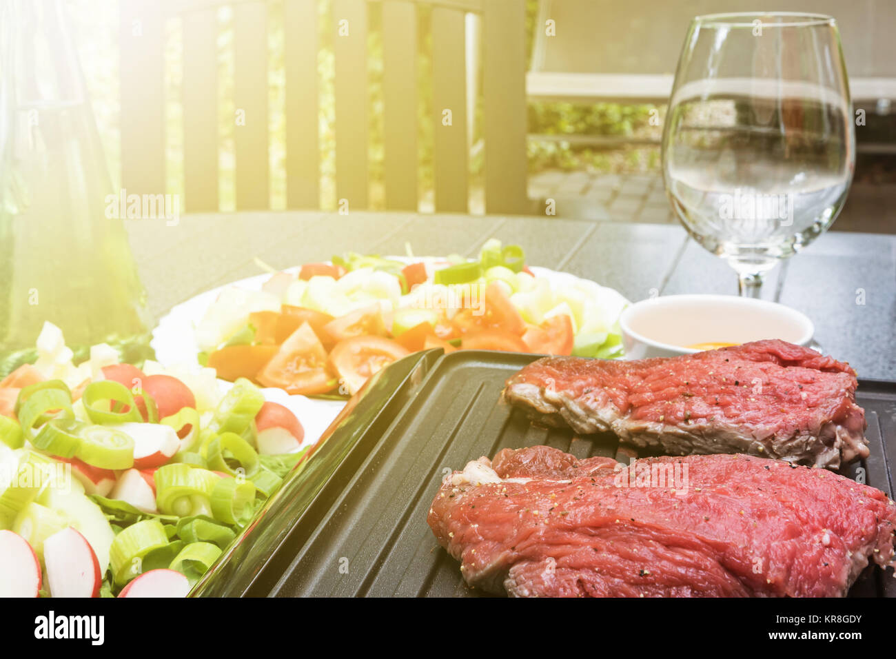 Grill steaks on an electric stove Stock Photo Alamy