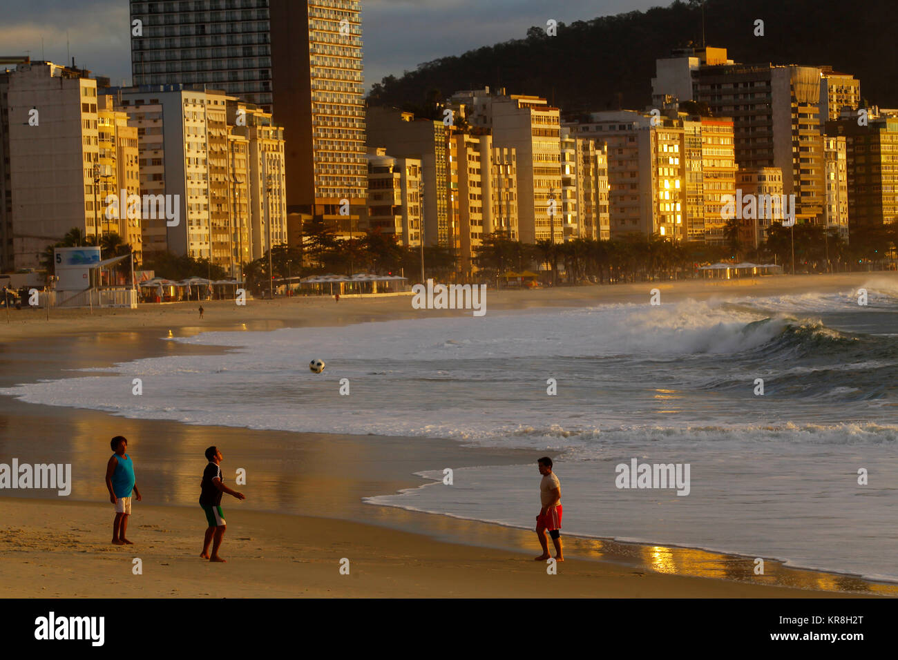 People playing football at Copacabana beach early in the morning, Rio de Janeiro, Brazil Stock Photo