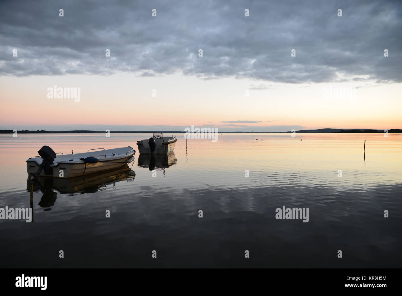 boats in the sunset Stock Photo - Alamy