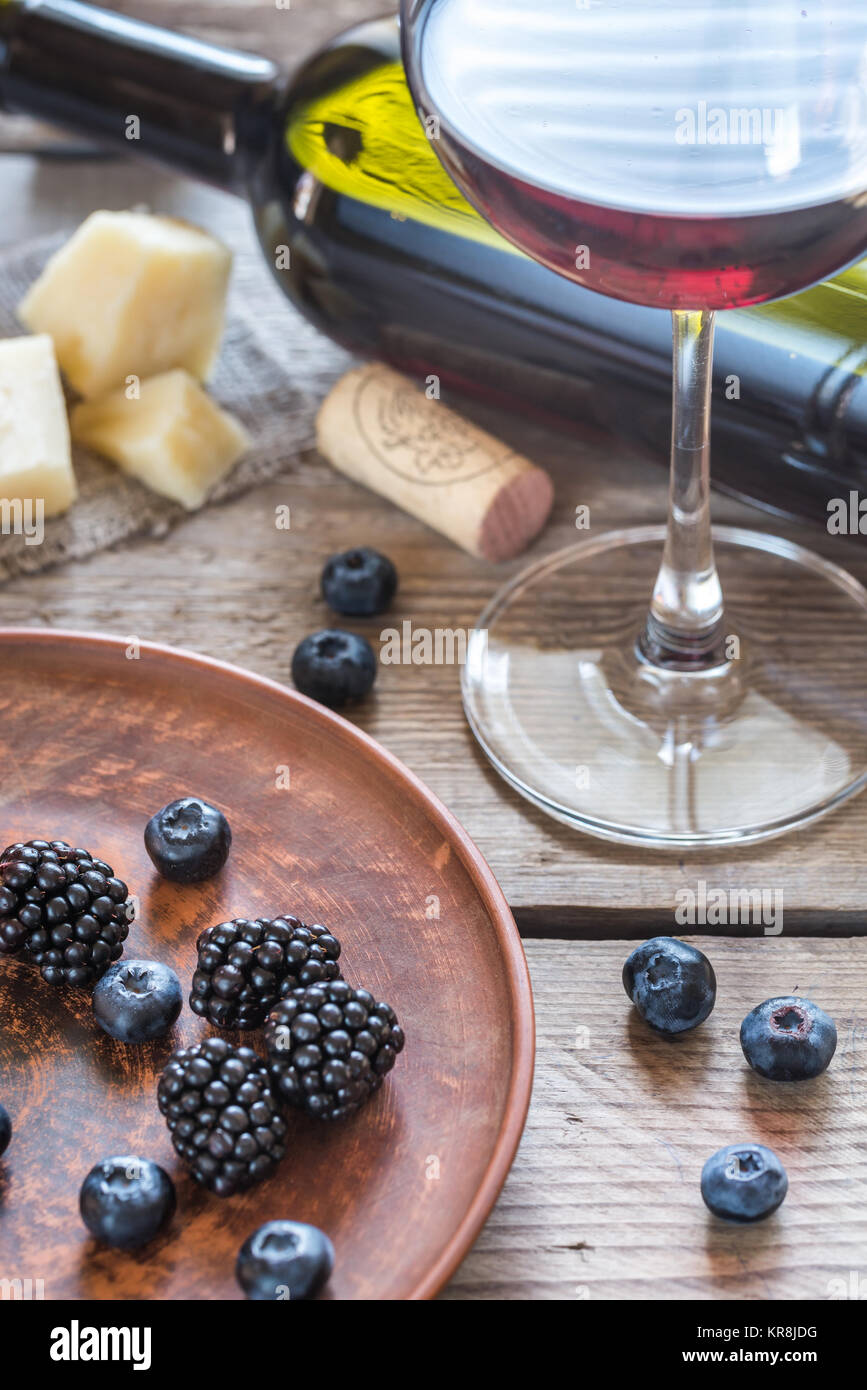 Wine with berries Stock Photo Alamy
