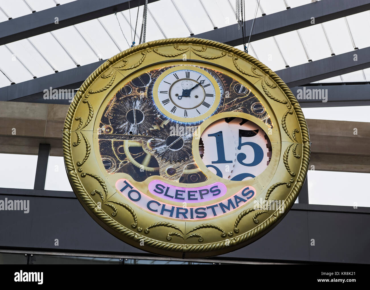 Clock in the likeness of a pocket watch counting down sleeps to Christmas at the entrance to Eldon square shopping centre on Northumberland Street, UK Stock Photo