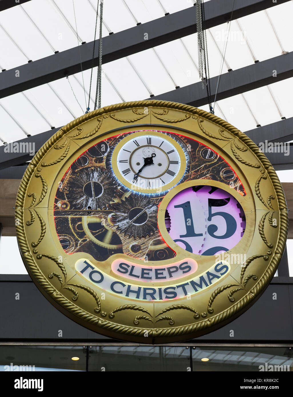 Clock in the likeness of a pocket watch counting down sleeps to Christmas at the entrance to Eldon square shopping centre on Northumberland Street, UK Stock Photo