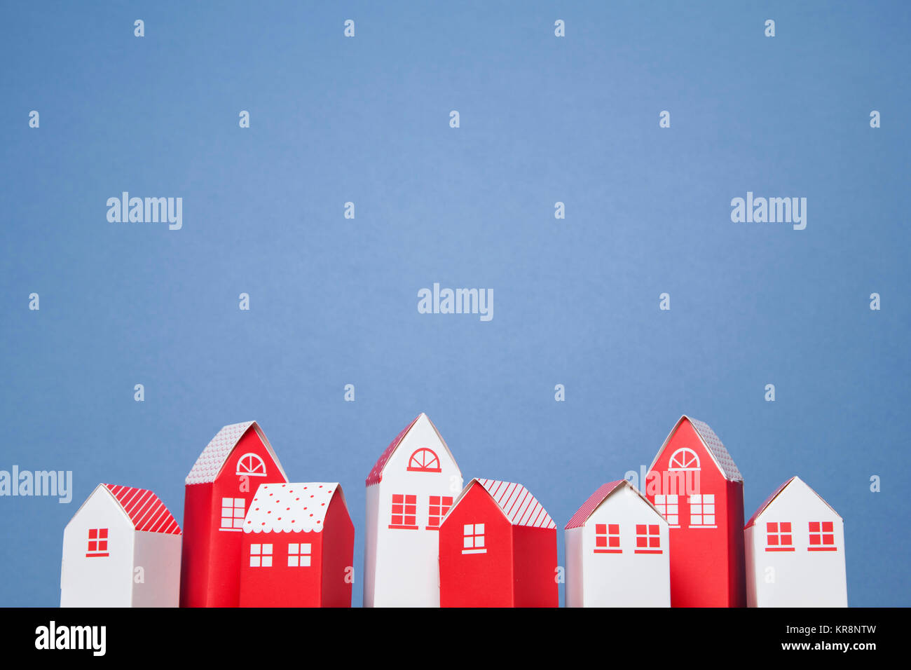 Row of paper toy houses Stock Photo