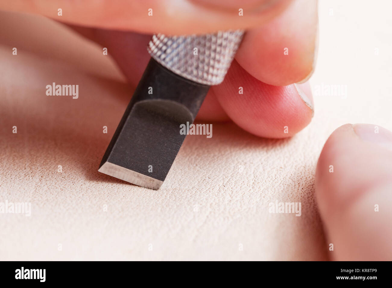 blade of swivel knife on leather for carving Stock Photo Alamy