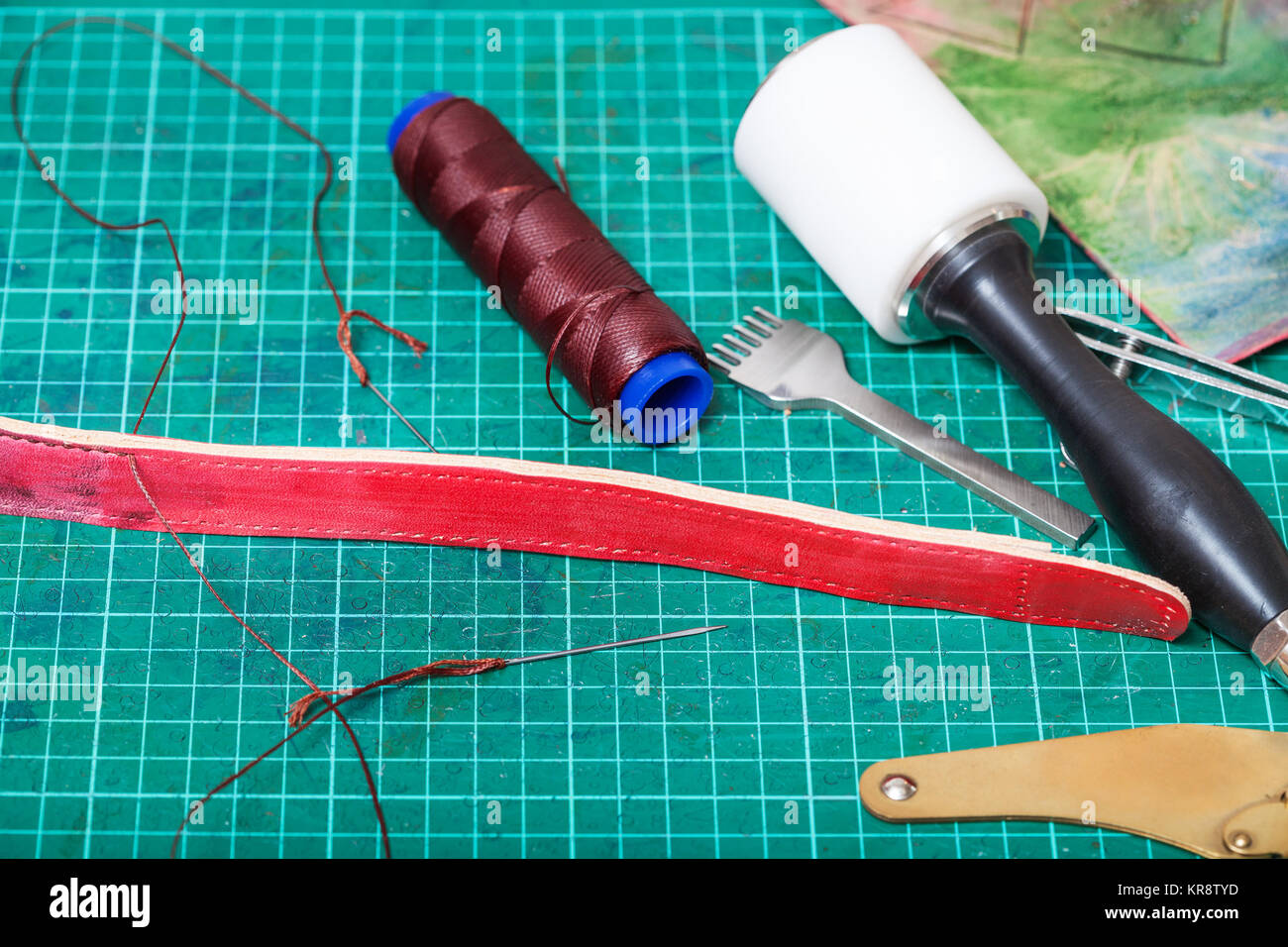 Chisel Point Sewing sewing tools and stitching chisel on mat Stock Photo - Alamy