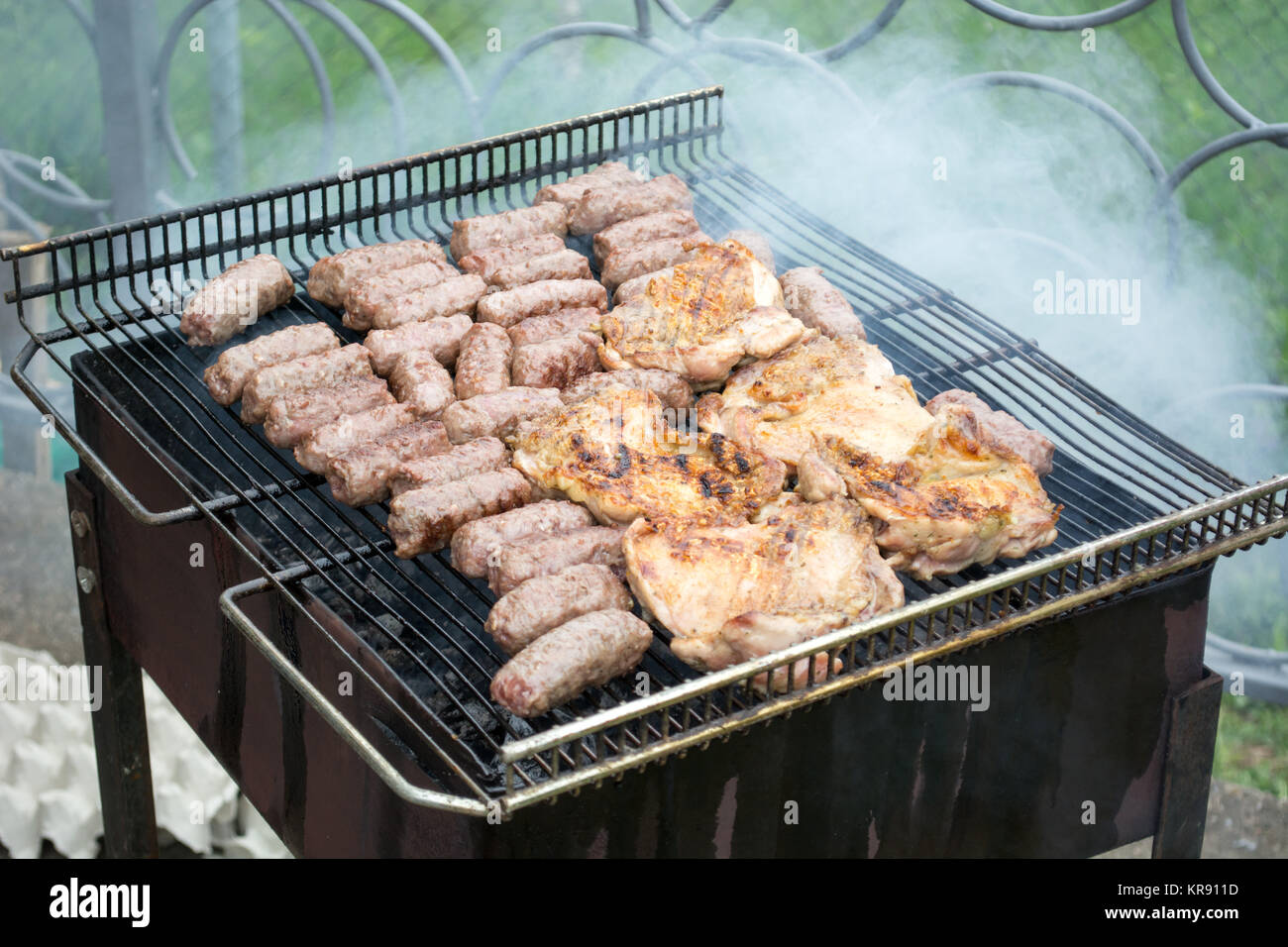 Grilling meat Stock Photo Alamy