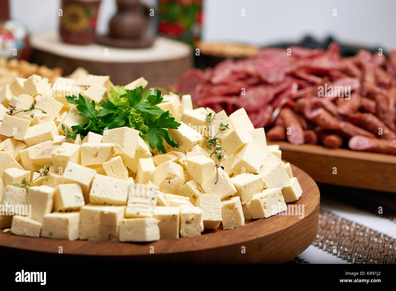 Great ammount of cheese appetizer,decorated with parsley Stock Photo