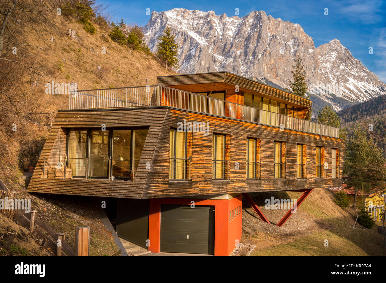 Mountain house with modern architecture Stock Photo - Alamy