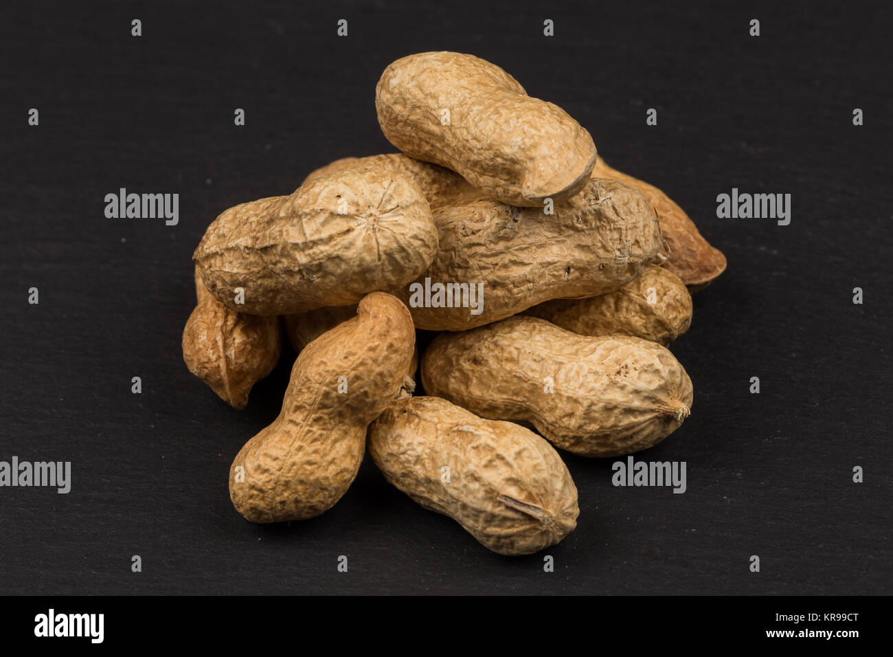 Raw peanuts shells Stock Photo Alamy