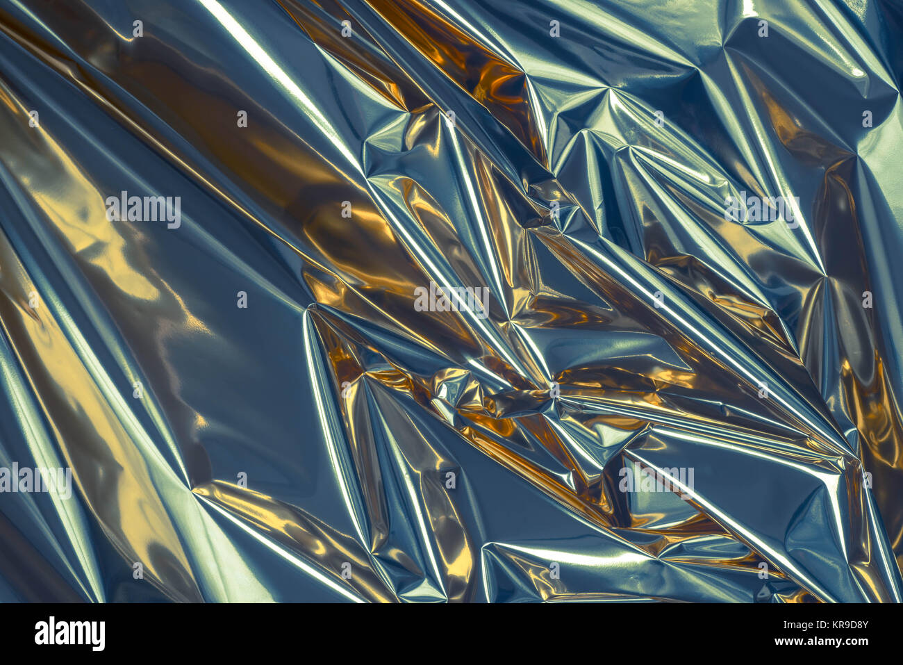 silver color folded metallic foil abstract bacgkground Stock Photo Alamy