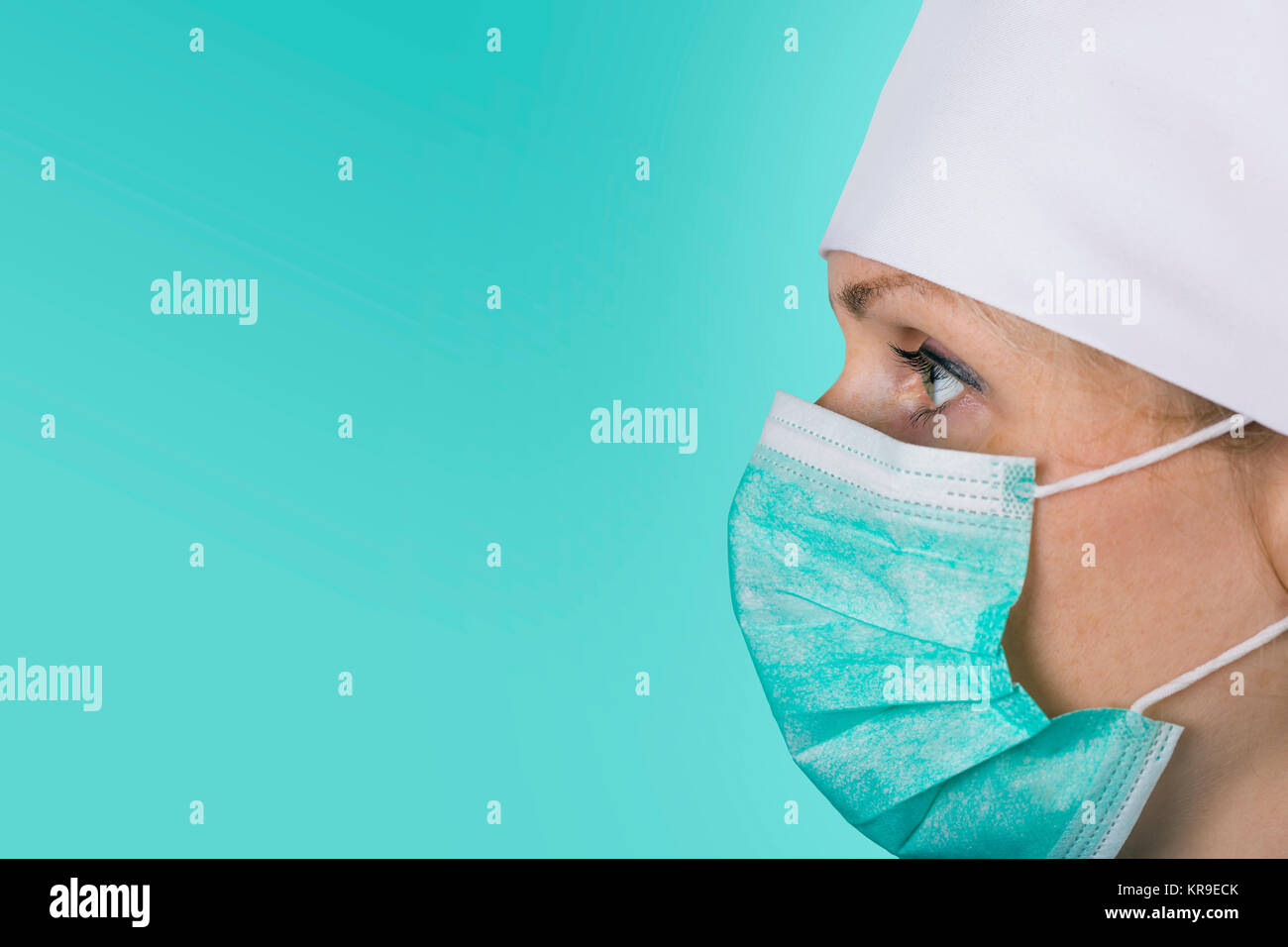 doctor nurse with facial mask on green Stock Photo