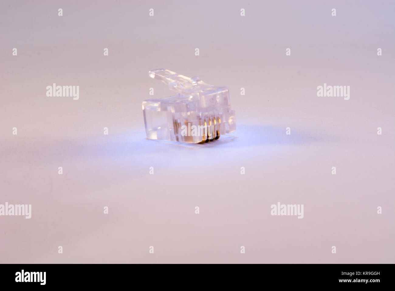 Single RJ-45 connector on white background Stock Photo - Alamy
