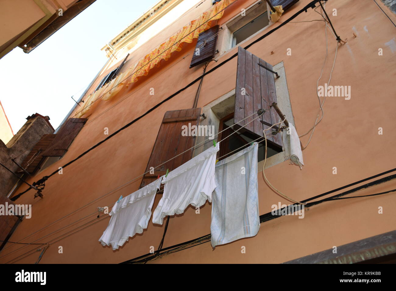 rovinj,city,old town,middle ages,houses,alley,stairs,clothesline Stock Photo