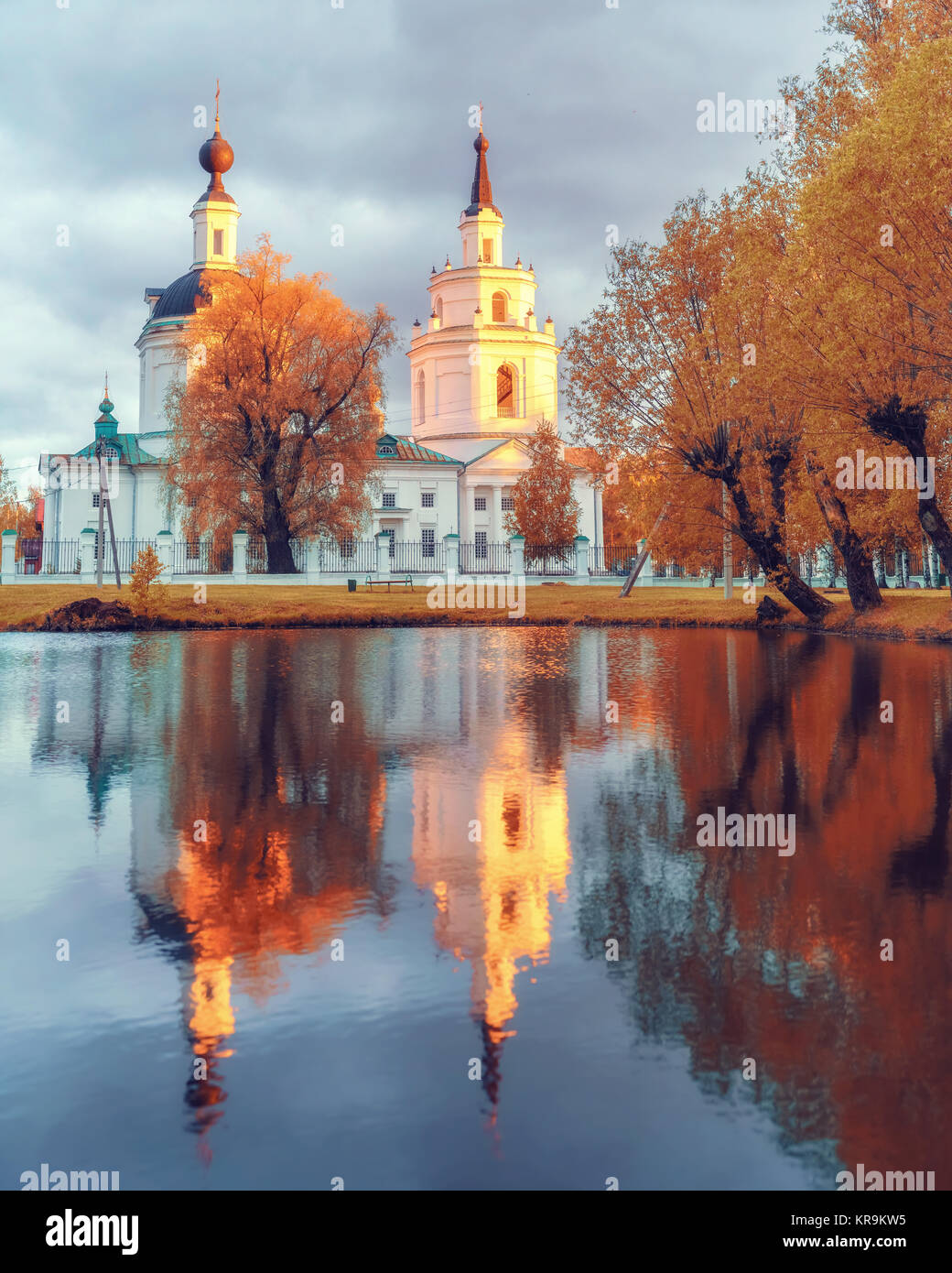 Ortodox church and its reflection in a pond. Stock Photo