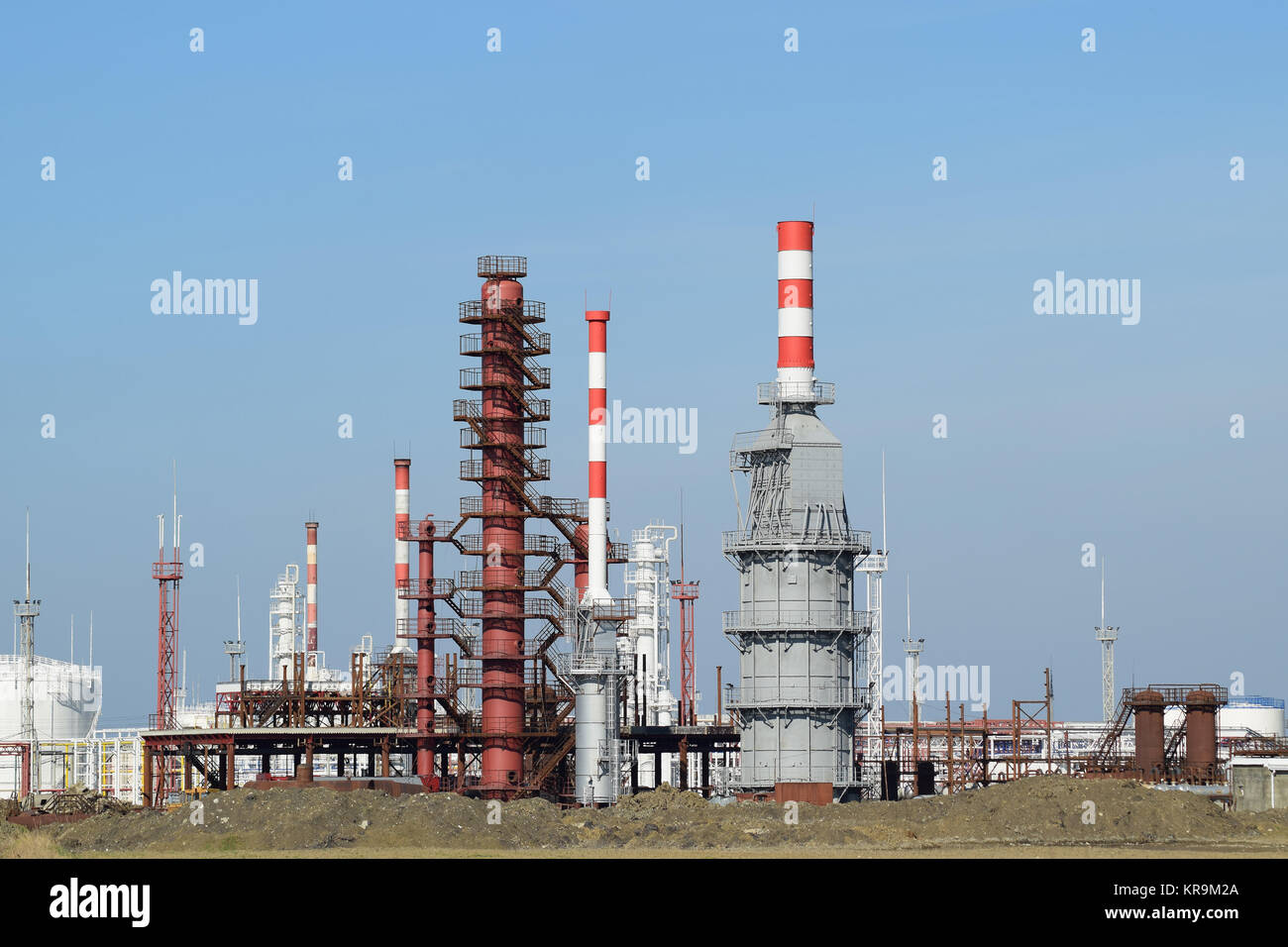 Distillation columns, pipes and other equipment furnaces refinery. Stock Photo