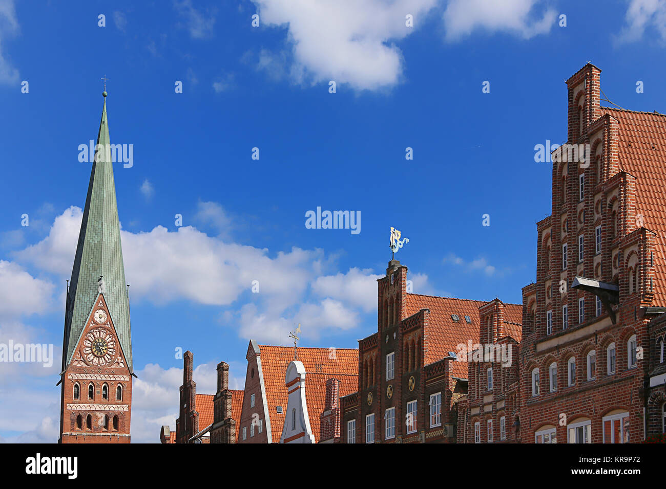 church tower of st. john's and gabled houses in lÃ¼neburg Stock Photo