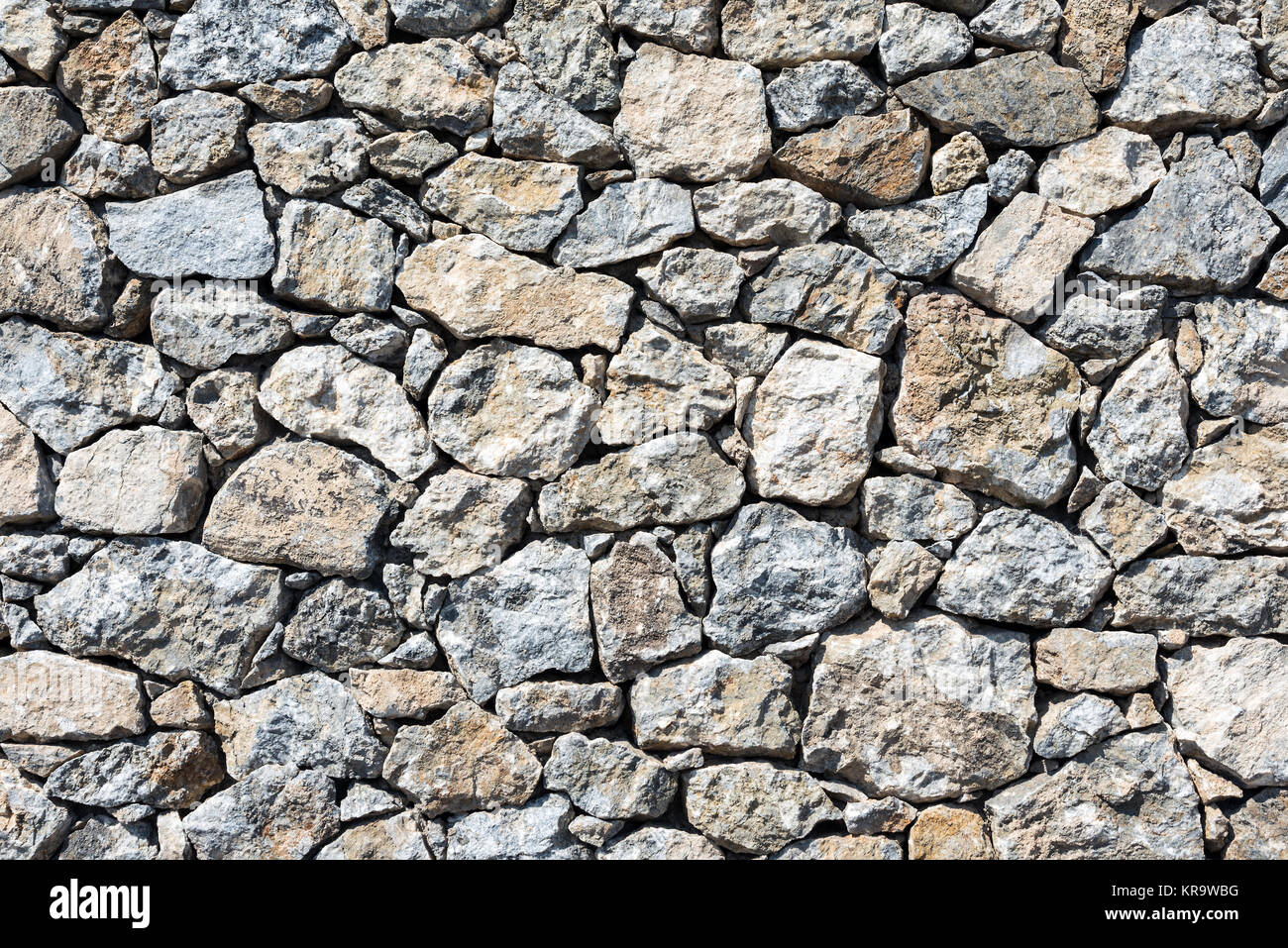 background of a rustic stone wall Stock Photo