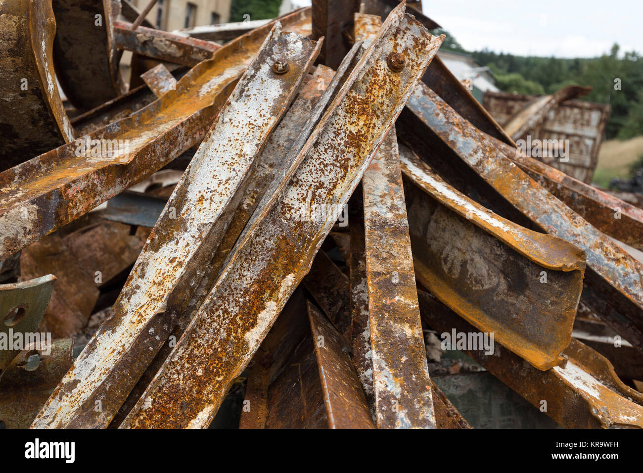 large rusty steel girders for recycling Stock Photo Alamy