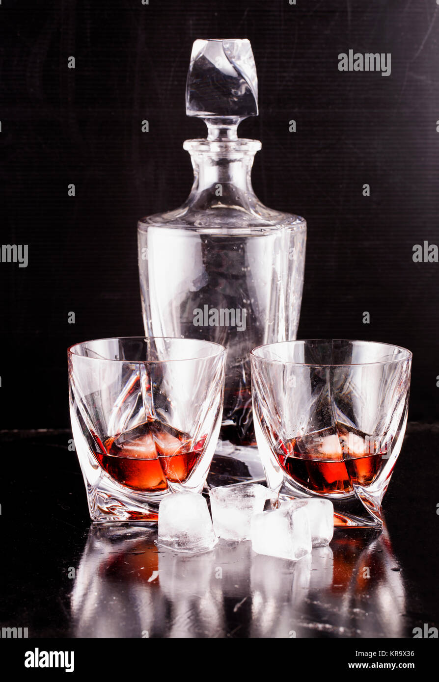 Liquor bottle and glasses Stock Photo Alamy