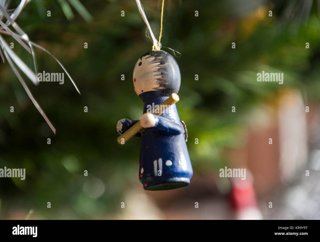 shepherd ornament hanging on christmas tree. Beautiful close up holiday photo. Stock Photo