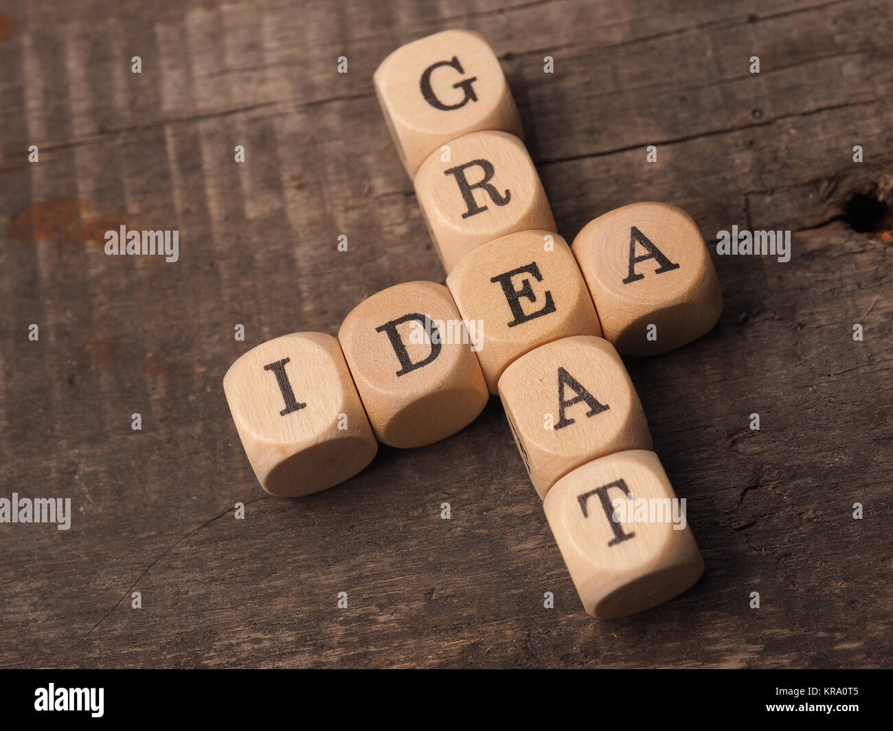 Wooden dices with the crosswords Great idea on a rustic table Stock