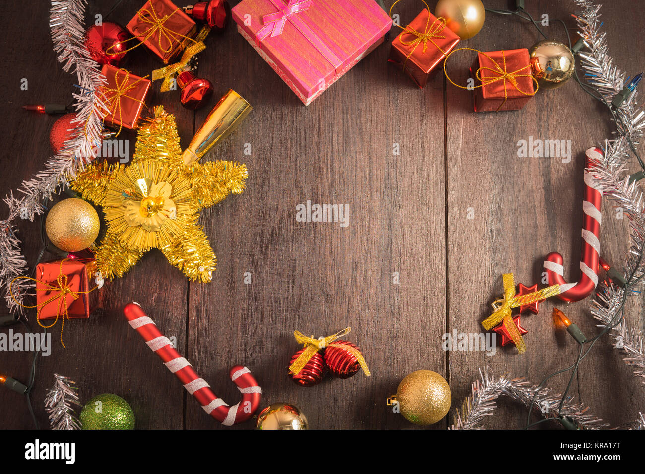 Christmas gift box, food decor and fir tree branch on wooden table. Top