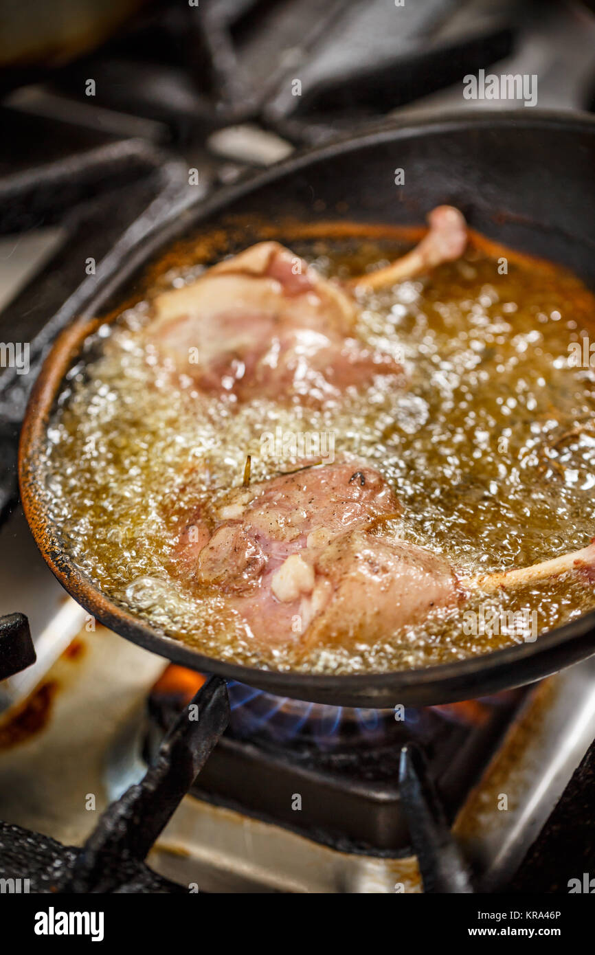 Duck legs frying Stock Photo - Alamy