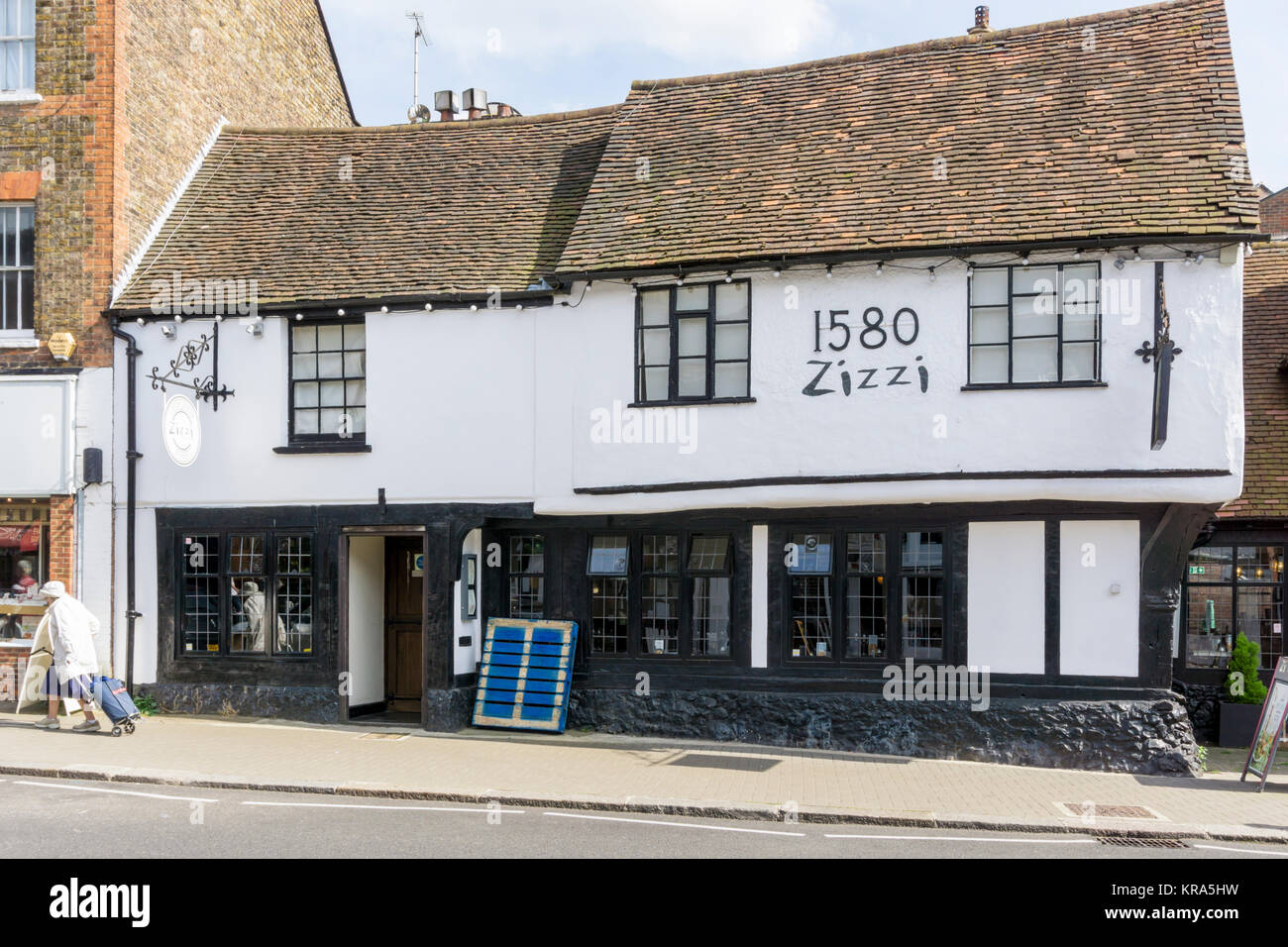 Zizzi restaurant on Pinner High Street occupies the former premises of The Victory pub; a Tudor building which dates back to 1580. Stock Photo
