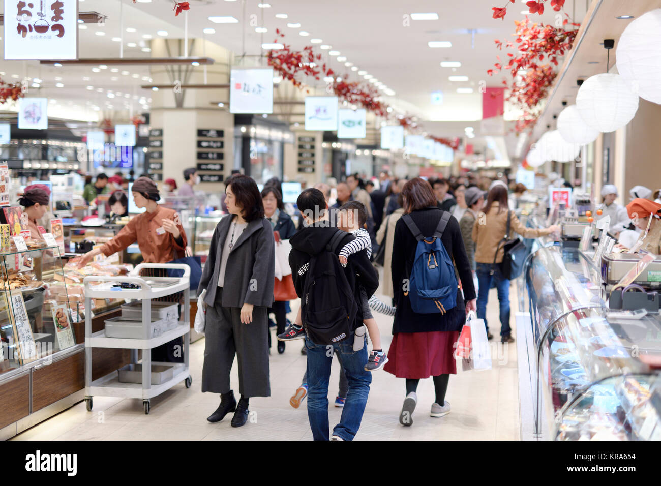 People in a Japanese food hall in Osaka, Japan 2017 Stock Photo