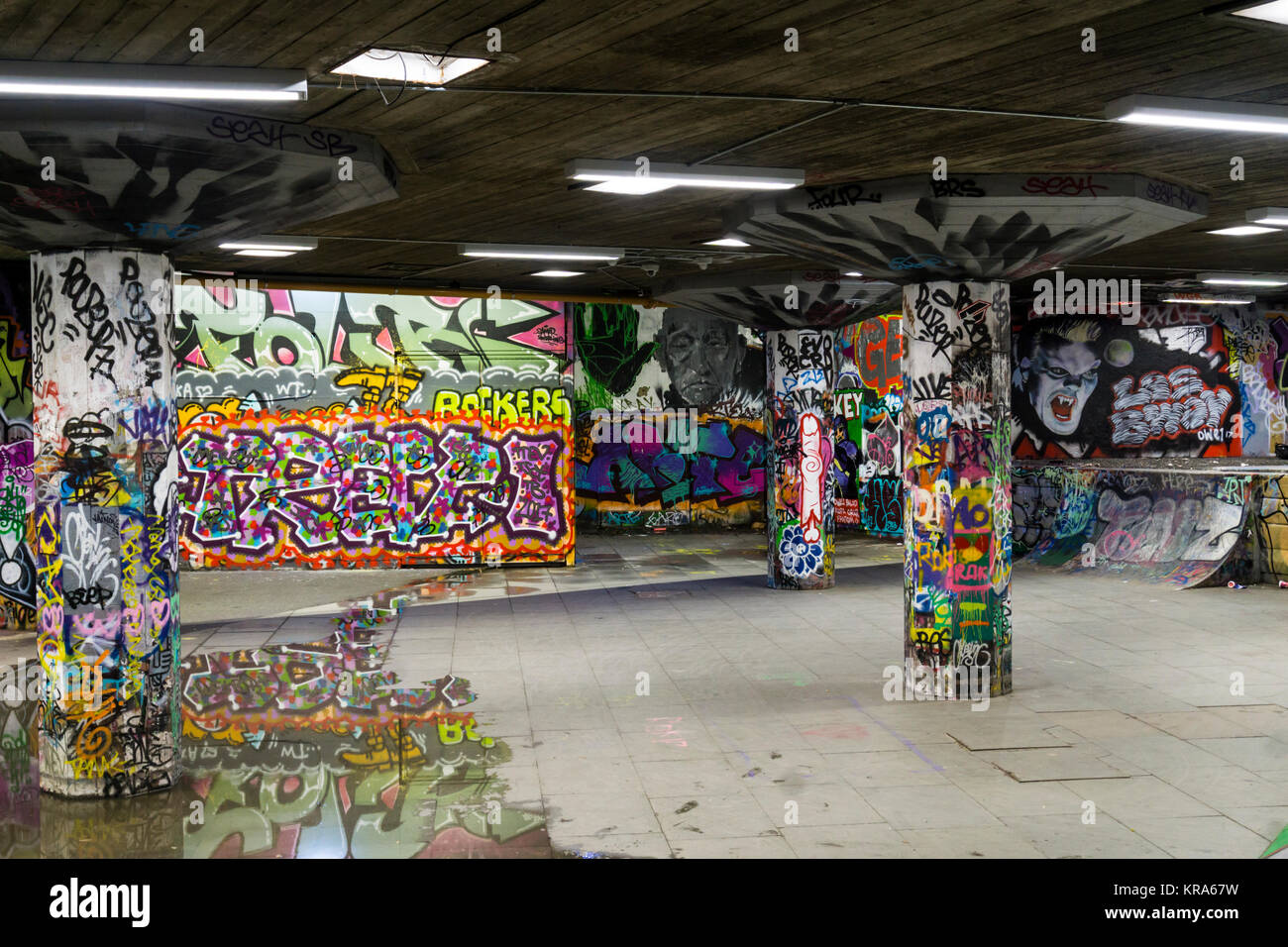 Graffiti on the walls of the Southbank undercroft skate park in London. Stock Photo
