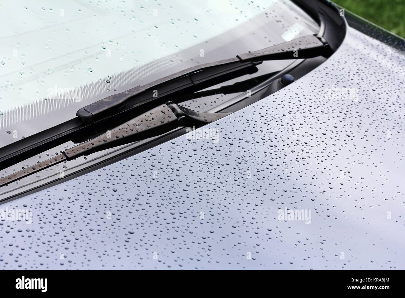 rainy weather and road - raindrops on a car Stock Photo