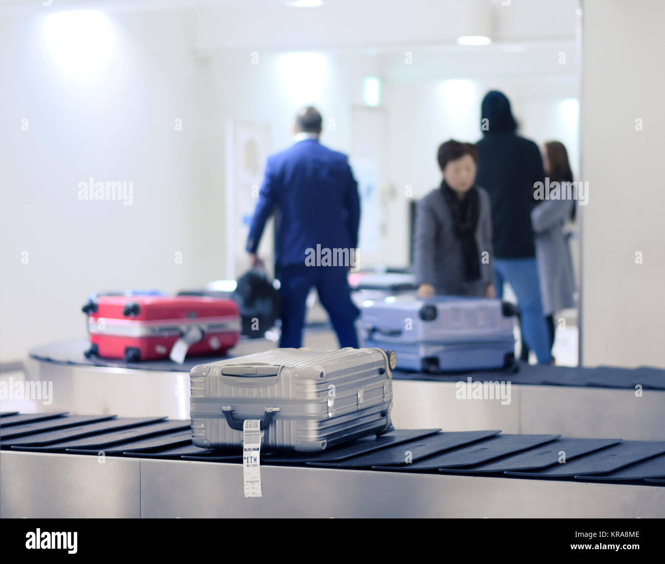 Suitcases, luggage on airport baggage claim conveyor carousel, Tokyo