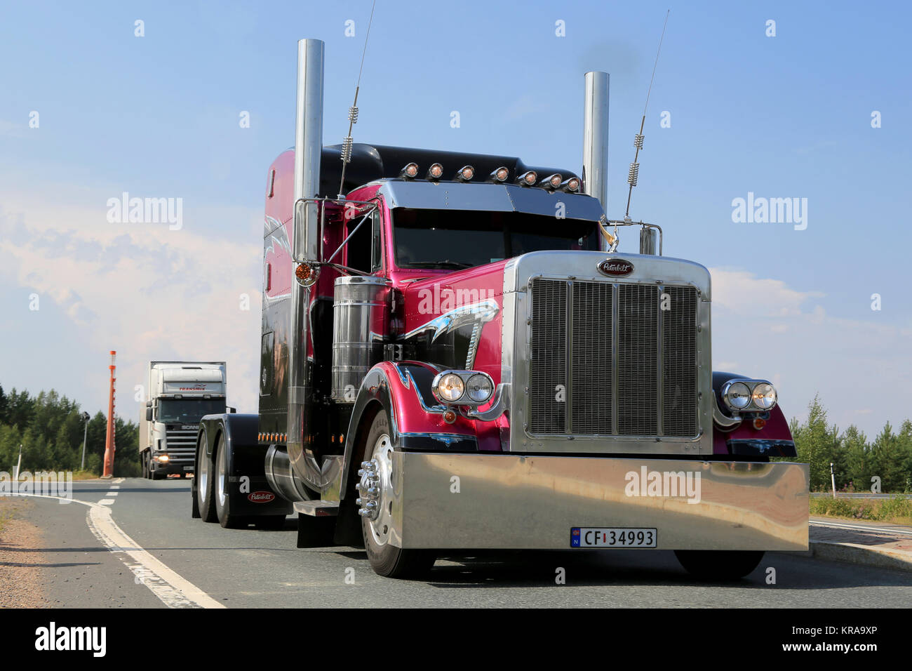 LEMPAALA, FINLAND - AUGUST 7, 2014: American Show truck tractor Peterbilt 379 from Norway arrives at Lempaala as part of the truck convoy to Power Tru Stock Photo