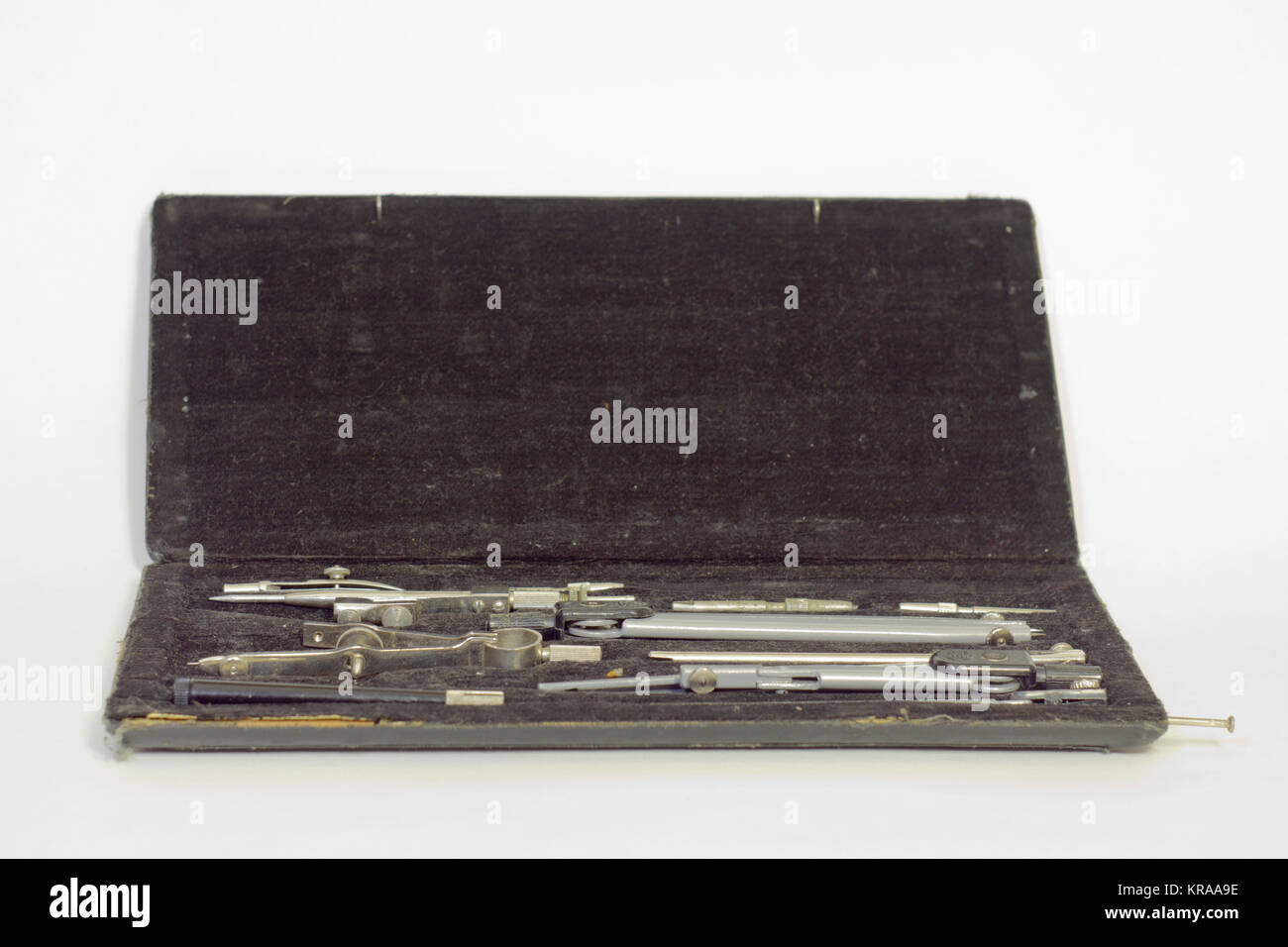 Set of precision technical drawing instruments in black case Stock