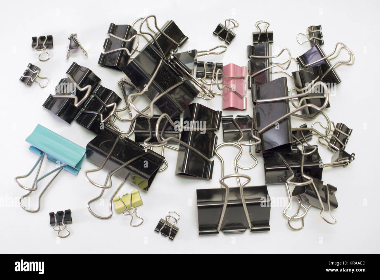 oodles of metal binder clips for paper, different sizes and colors