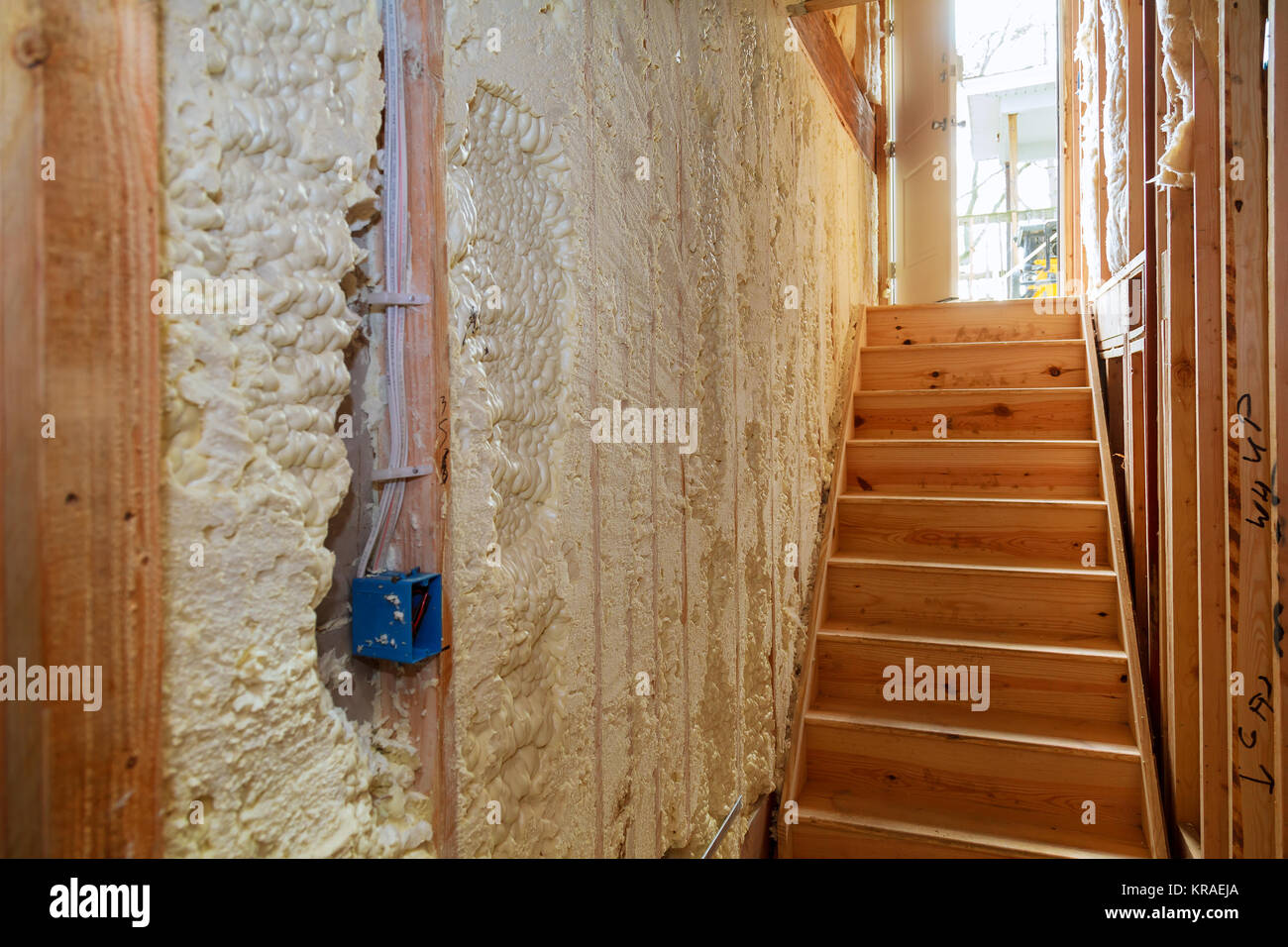 thermal and hidro insulation Inside wall insulation in wooden house, building under construction Stock Photo