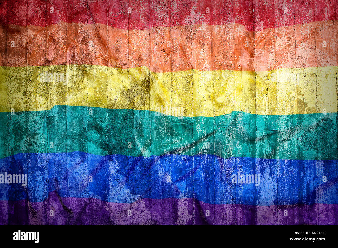 Rainbow flag on a brick wall for background Stock Photo - Alamy