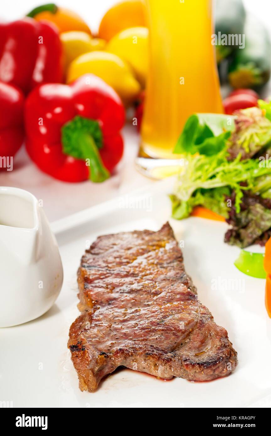 juicy bbq grilled rib eye ribeye steak and vegetables Stock Photo Alamy