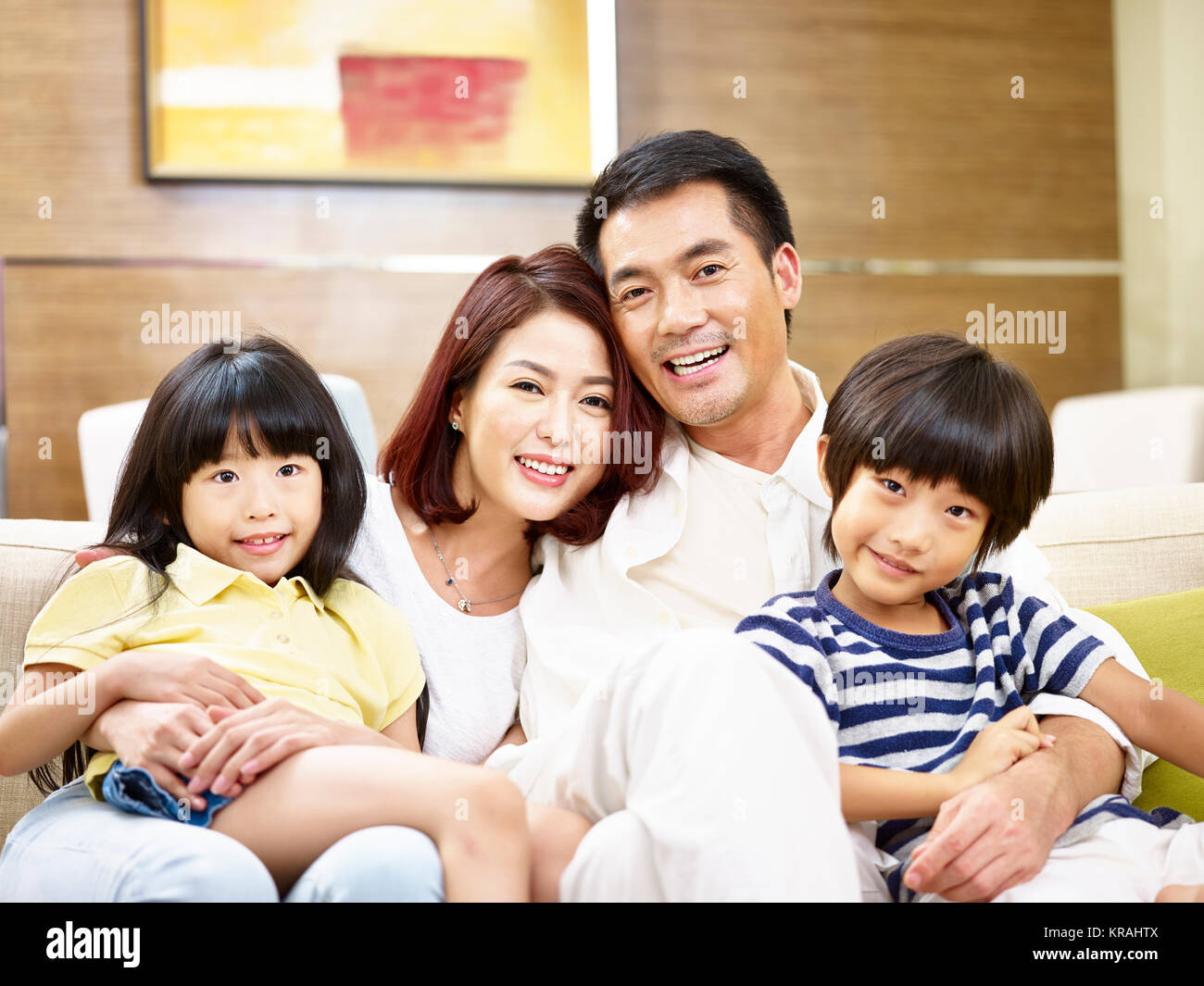 pix Happy Asian Family Photo https www alamy com stock image portrait of a happy asian family sitting on couch at home looking 169263946 html