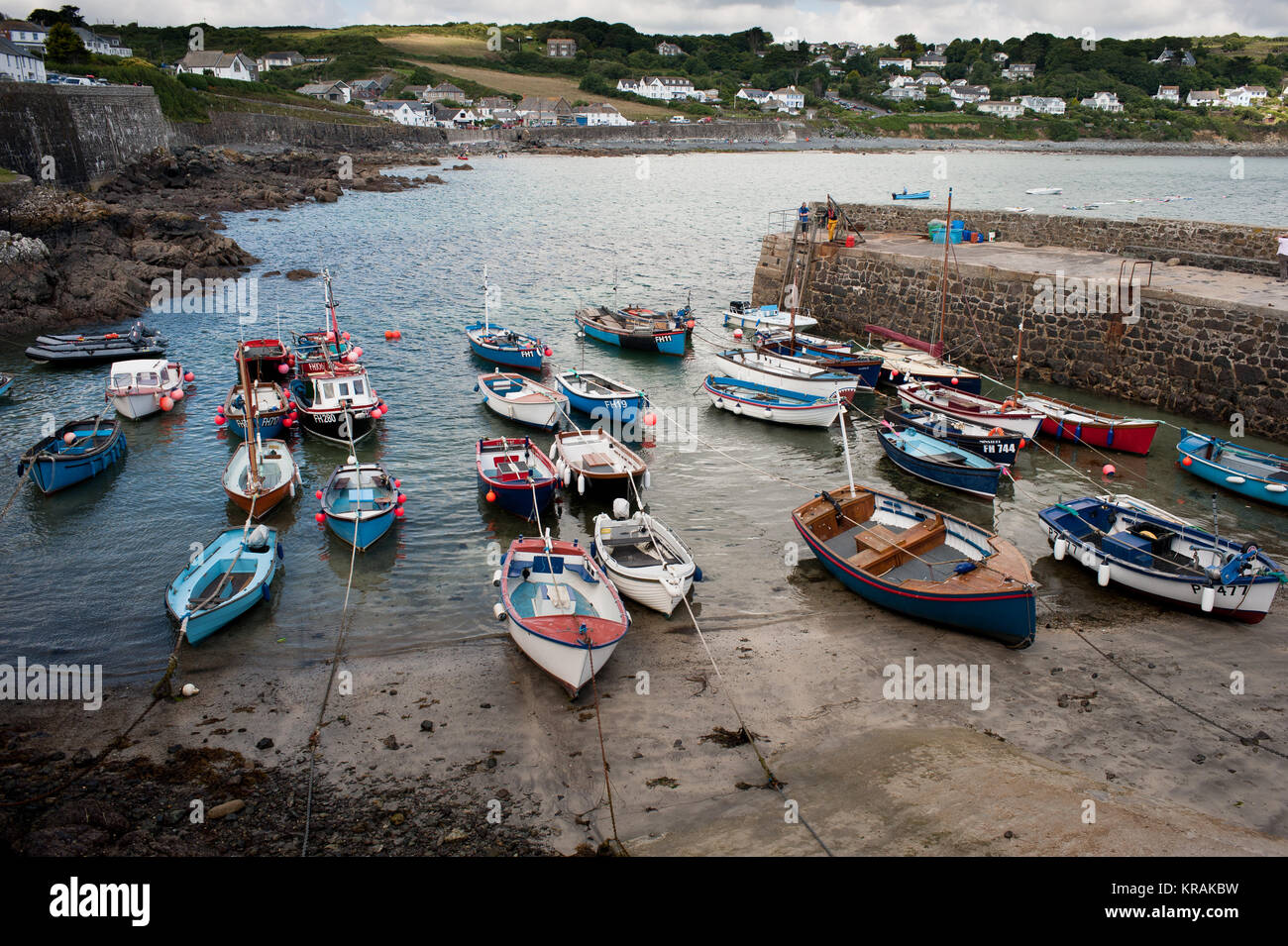 Colourful fishing boats in the harbour of Coverack, Cornwall. Stock Photo
