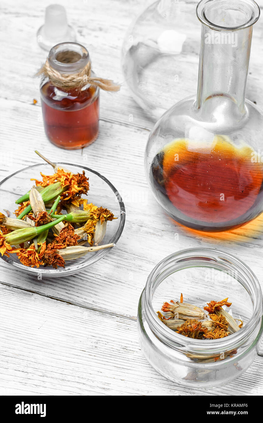 Medical extract decoction from the flowers of marigold Stock Photo Alamy