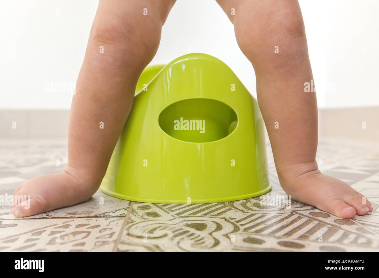 Crop the children's legs over the chamberpot Stock Photo Alamy