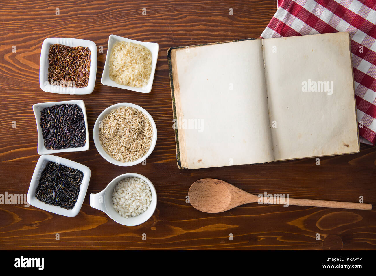 Blank cookbook and different rice varieties Stock Photo - Alamy